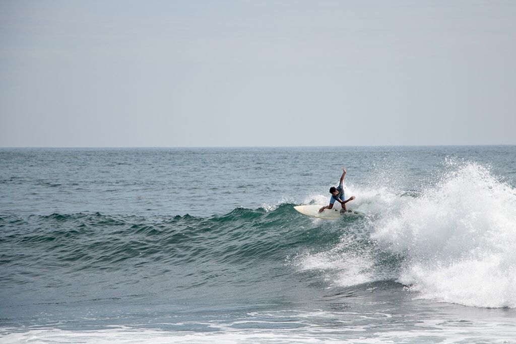 Surfer on a wave in El Salvador.